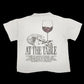 AT THE TABLE T-SHIRT